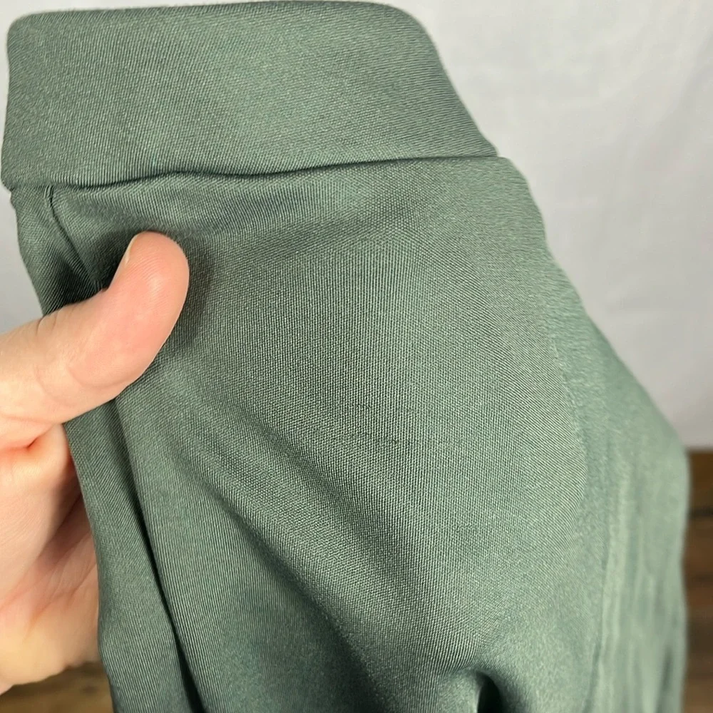Alo‎ Yoga High-Waist Zip it Flare Legging in Dark Cactus Green.